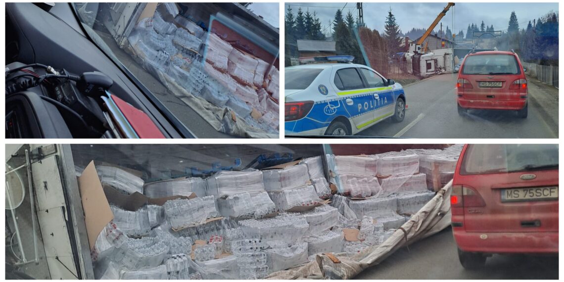 FOTO Un camion încărcat cu apă minerală s-a răsturnat în localitatea Dorna Arini. Șoferul a avut nevoie de îngrijiri medicale