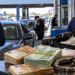 Șefi, polițiști de frontieră și vameși de la Halmeu, acuzați de DNA că ar fi pus la punct o ”fabrică” de șpagă. Peste 300.000 de euro, găsiți la percheziții. Cum ar fi fost colectați și împărțiți banii